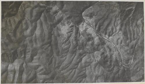 Section of a photographic mosaic of mountain ranges near Wollondilly River, New South Wales, ca. 1939 [picture] / E.W. Searle