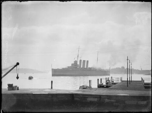 HMAS Canberra moored off Man-o-War Steps, Bennelong Point, Sydney Harbour, ca. 1929 [picture] / E.W. Searle