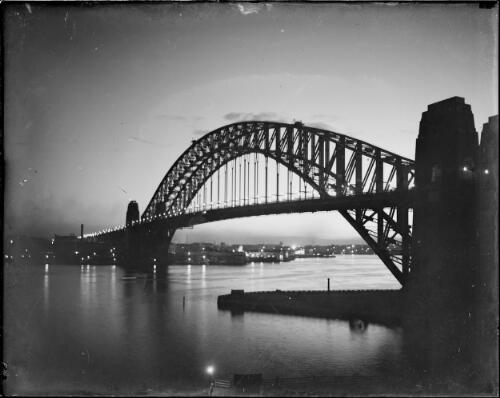 Harbour Bridge at night from Kirribilli, Sydney Harbour, ca. 1947, 1 [picture] / E.W. Searle