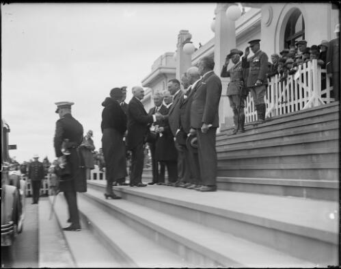 Sir Isaac Isaacs and Lady Isaacs with Prime Minister Lyons and ministers on the steps of Parliament House, Canberra, 1932 [picture] / E.W. Searle