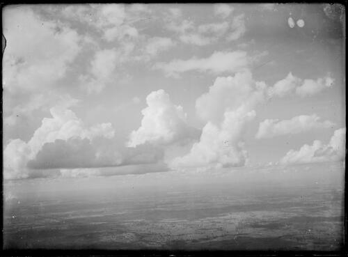 High altitude aerial view of clouds and agricultural land, New South Wales, ca. 1945, 2 [picture] / E.W. Searle