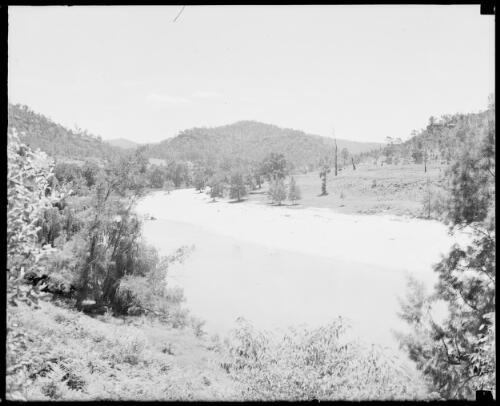 River winding past partly cleared hills, Australia, ca. 1935, 1 [picture] / E.W. Searle