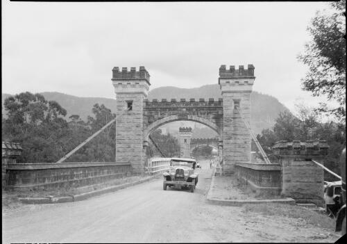 Car parked on Hampden Bridge, Kangaroo Valley, New South Wales, ca. 1935 [picture] / E.W. Searle