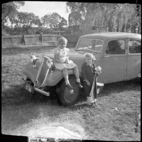 Two children with E.W. Searle's Citroen, Oxford Falls, New South Wales, ca. 1945 [picture] / E.W. Searle