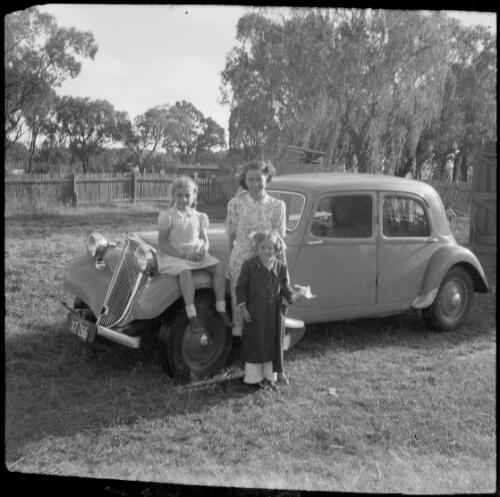 Mrs Searle with two children and E.W. Searle's Citroen, Oxford Falls, New South Wales, ca. 1945 [picture] / E.W. Searle