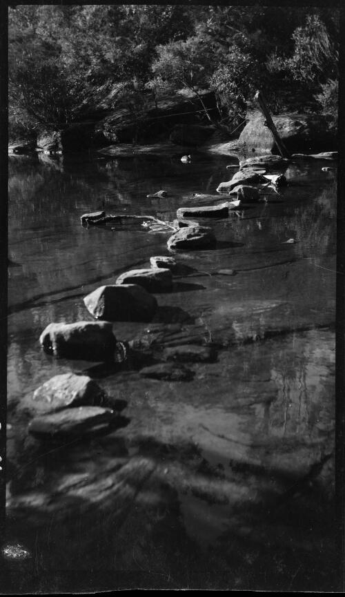 Boulders across an unidentified river, Australia, ca. 1935 [picture] / E.W. Searle