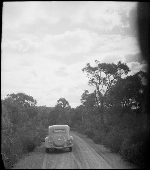 E.W. Searle's Citroen stopped on a dirt road, Australia, ca. 1945 [picture] / E.W. Searle