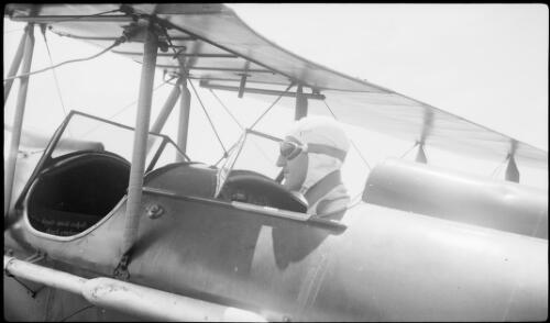 Pilot seated in a biplane, Australia, ca. 1925 [picture]