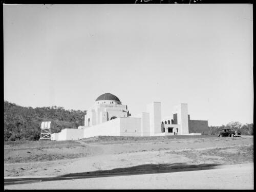 Exterior view of the Australian War Memorial with car, Canberra, ca. 1949 [picture] / E.W. Searle