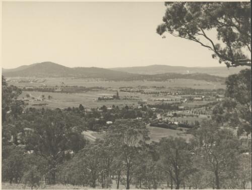 View across valley from Red Hill to Mount Ainslie with St. Andrew's church in the centre, Canberra, ca. 1949 [picture] / E.W. Searle
