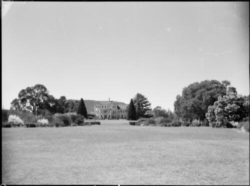 Rear view of the Governor-General's residence and gardens, Yarralumla, Canberra, ca. 1949 [picture] / E.W. Searle