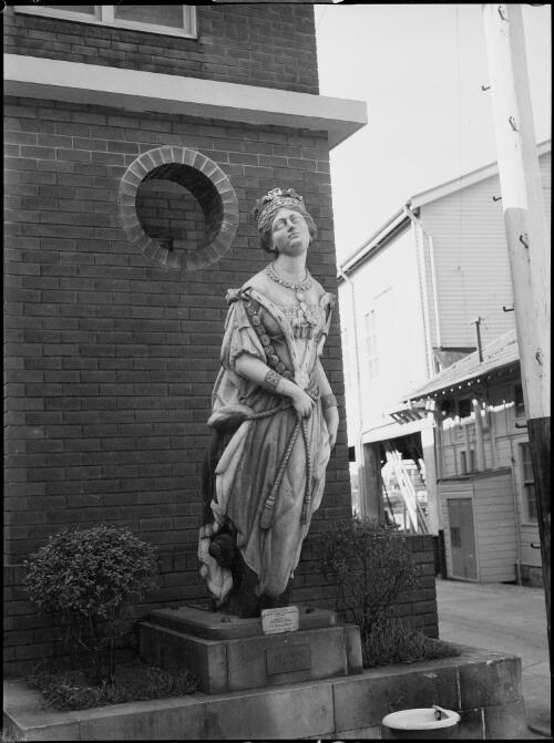 Queen Victoria, the figurehead from the sailing ship Windsor Castle, Garden Island, Sydney Harbour, ca. 1935, 1 [picture] / E.W. Searle