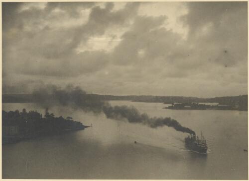 Cargo ship under steam, Sydney Harbour, ca. 1935 [picture] / E.W. Searle