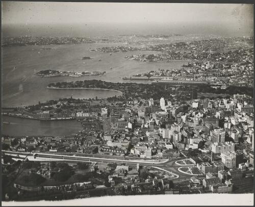 Aerial view of the Bradfield Highway, the city and the Royal Botanic Gardens from the west, Sydney, ca. 1935, 2 [picture] / E.W. Searle