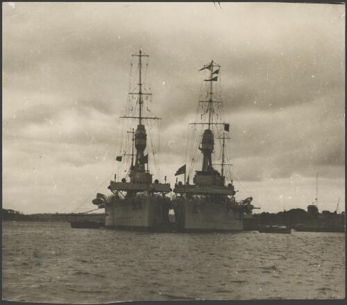 Two battle cruisers moored together, Sydney Harbour, ca. 1925 [picture] / E.W. Searle