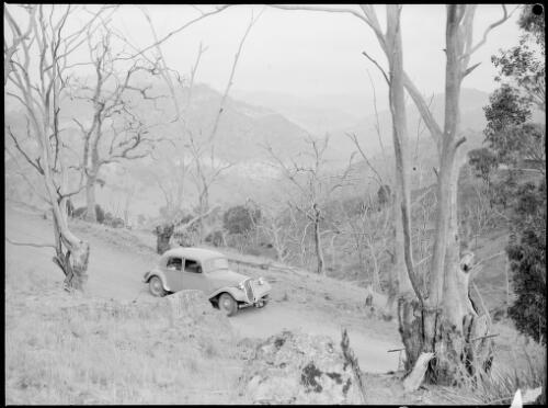 E.W. Searle's Citroen on a road near Barrallier Crossing, Wollondilly River, New South Wales, ca. 1945, 1 [picture] / E.W. Searle