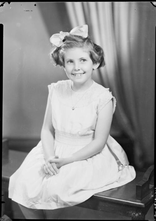 Portrait of a young girl with a ribbon in her hair, Australia , ca. 1945, 3 [picture] / E.W. Searle