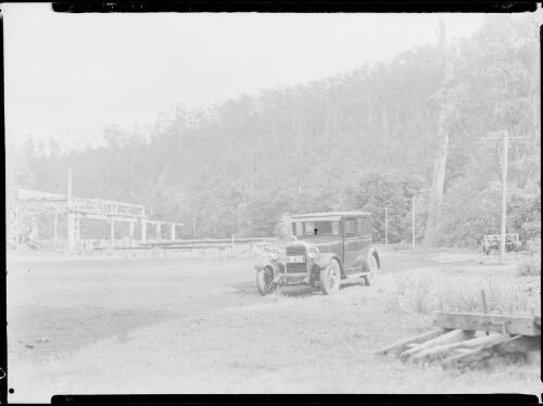 E.W. Searle's Erskine parked beside a logging camp, New South Wales, ca. 1930 [picture] / E.W. Searle