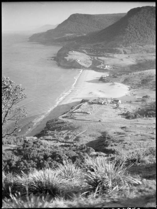 Hilltop view of a beach and settlement, Australia, ca. 1935, 1 [picture] / E.W. Searle