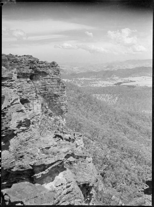 Cliff face with valley in the background, Australia, ca. 1935, 1 [picture] / E.W. Searle