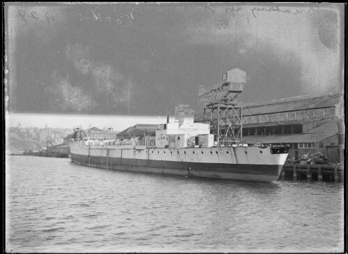 HMAS Sydney being broken up, Cockatoo Island, Sydney Harbour, 1929 [picture] / E.W. Searle