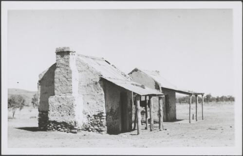 Two houses each with a three post verandah, Northern Territory, 1947 [picture] / E.W. Searle