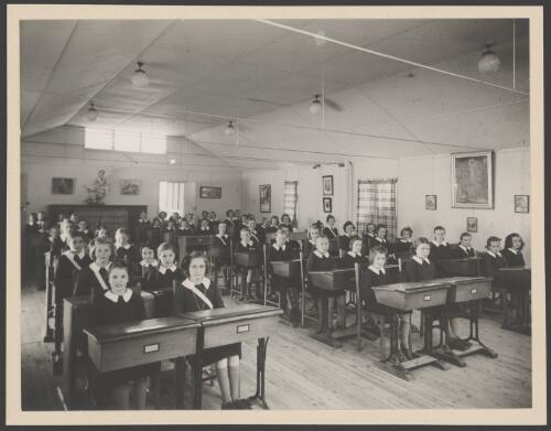 Girls in classroom at Stuartholme Convent, Brisbane, approximately 1950 / E.W. Searle