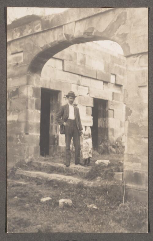 Edward W. Searle and son Allan on the steps of the Model Prison, Port Arthur [Tasmania], Easter 1913 [picture]
