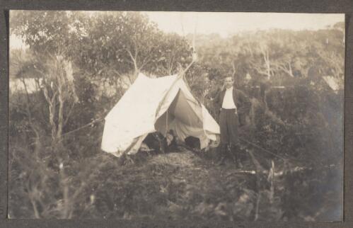 Edward Searle standing next to the tent, Port Arthur [Tasmania], Easter 1913 [picture]