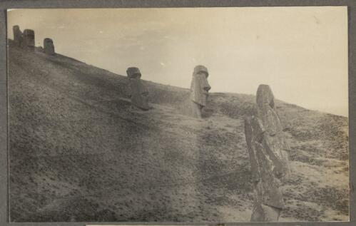 Statues alongside the hill, Easter Island [picture]