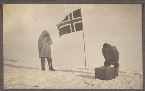 Taking hold of the camera at the South Pole, 14th December, 1911 [picture]