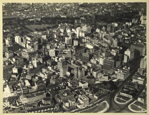 [Aerial view of Sydney central business district with The Domain and Hyde Park at top] [picture]