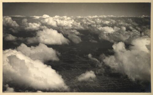 [Aerial view of Sydney suburban area beneath clouds] [picture]