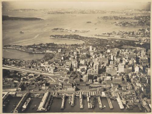 [Aerial view of Sydney central business district, Darling Harbour, Circular Quay and the Botanic Gardens] [picture] / E. W. Searle