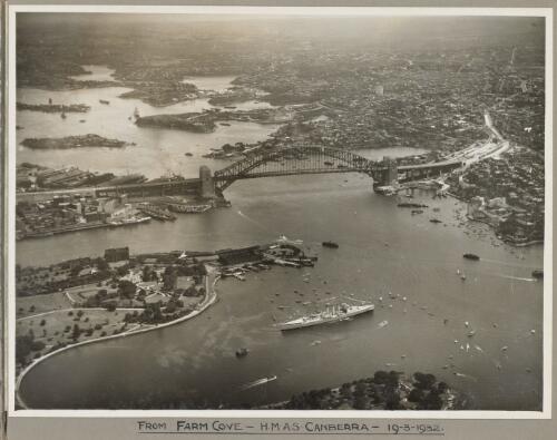 Sydney Harbour Bridge with HMAS Canberra in foreground taken from Farm Cove, 19 March 1932 [picture] / E. W. Searle
