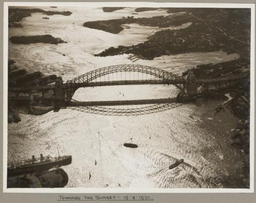 Sydney Harbour Bridge at sunset, 19 March 1932 [picture] / E. W. Searle