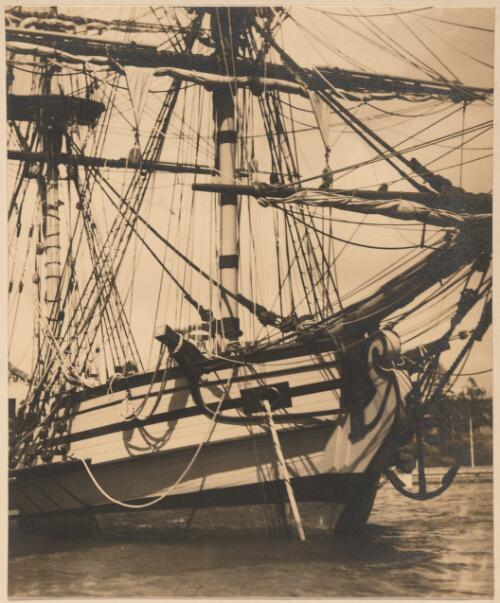 A view of the bow end of a double masted sailing ship with rigging, Sydney Harbour, New South Wales [picture] / E.W. Searle