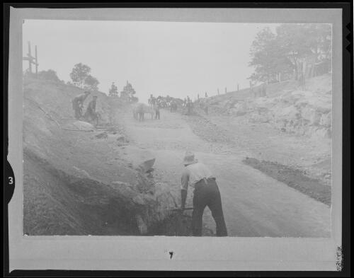 Men working on road construction, the big dipper, Berry, New South Wales, ca. 1918 [picture]