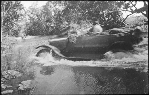 Car fording a river [transparency] : a deputation lantern slide of the AIM [Australian Inland Mission] Head Office, 1926-1940 / [John Flynn?]