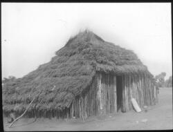 Wooden Hut With Thatched Roof Used As A Meat House [transparency 