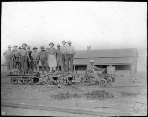 Rail gang in the outback [transparency] : taken on survey trip undertaken in 1927 by Rev. J.A. Barber and Dr. George Simpson for the Flying Doctor Scheme