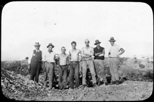 Seven unidentified asbestos workers? [transparency] : taken on a survey trip undertaken in 1927 by Rev. J.A. Barber and Dr. George Simpson for the Flying Doctor Scheme-