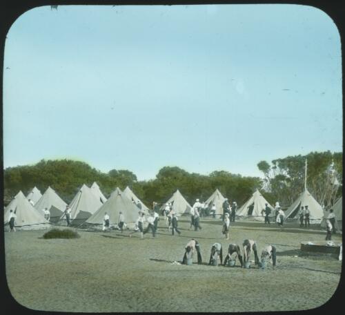 Naval campsite with tents in background, Australia [transparency] : miscellaneous glass slide / [John Flynn?]