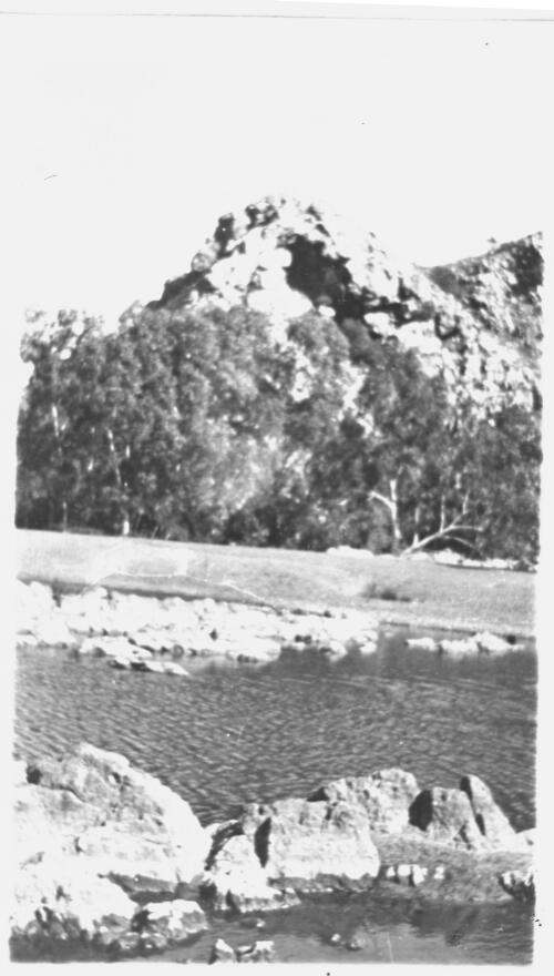 Large hill with a river below [picture] : Fred McKay Cape York Peninsula and West Queensland Patrol 1938-1940 / [Fred McKay]