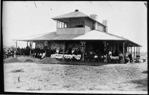 Opening ceremony of the Alice Springs hostel, 24 June 1926 [1] [transparency] : a deputation lantern slide of the AIM [Australian Inland Mission] Head Office, 1926-1940 / [John Flynn?]