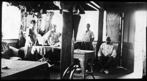 Patient and staff at Port Hedland hospital [transparency] : taken on a survey trip undertaken in 1927 by Rev. J.A. Barber and Dr. George Simpson for the Flying Doctor Scheme