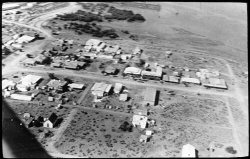 Aerial view of Port Hedland [transparency] : taken on a survey trip undertaken in 1927 by Rev. J.A. Barber and Dr. George Simpson for the Flying Doctor Scheme