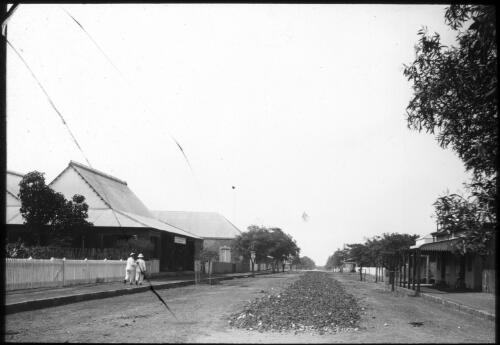 View of a street in Darwin [transparency] : taken on a survey trip undertaken in 1927 by Rev. J.A. Barber and Dr. George Simpson for the Flying Doctor Scheme