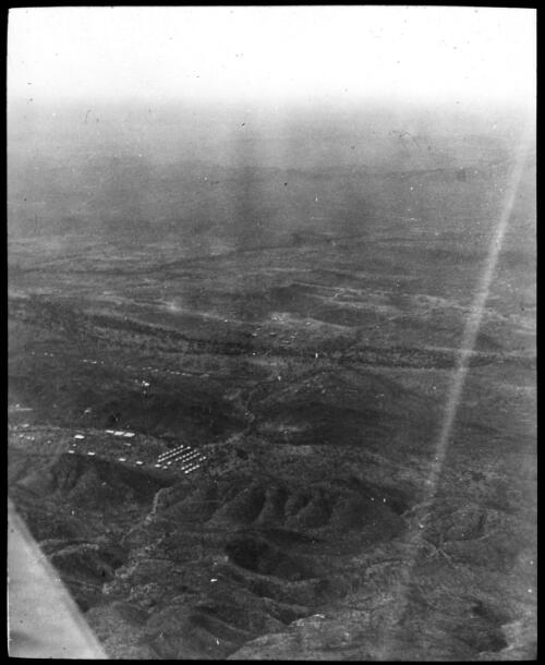 Aerial view of Mt. Isa, Queensland [transparency] : taken on a survey trip undertaken in 1927 by Rev. J.A. Barber and Dr. George Simpson for the Flying Doctor Scheme