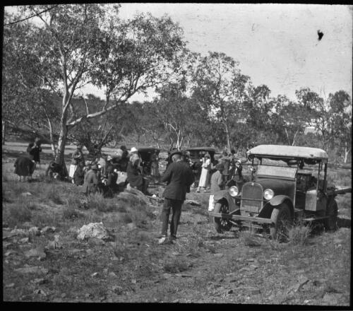 Group at picnic in bush [transparency] : a deputation slide of the AIM [Australian Inland Mission] Head Office, 1926-1940 / [John Flynn?]